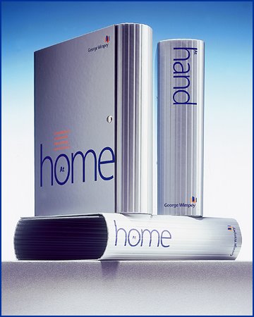 round spined ring binder, folder, wallet and case in silverpaper over board with popper stud