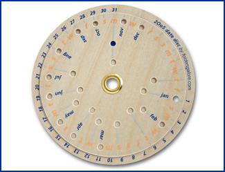 date disc made in thin wood, align the holes to make an event, conference, pit pass or invitation calender