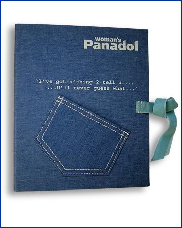 ring binder covered in printed jean material with sewed details