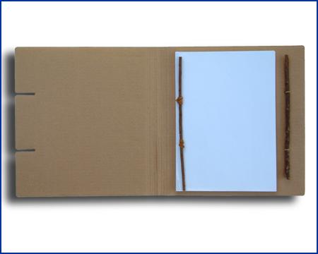 recycled and recyclable open binder made from twigs and paper