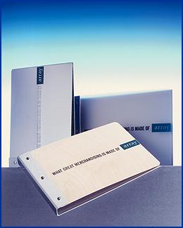 picture of duotech in wood folders, metal binders, frosted and paper over board wallets