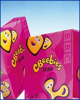 cbeebies slipcase in pink, yellow and black made in paper over board